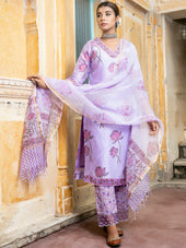 a woman in a pink dress