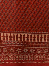 a close up of a red and white cloth