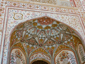 an intricately decorated archway in a building