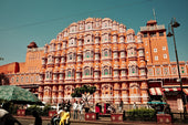 Ornate pink palace facade with many windows