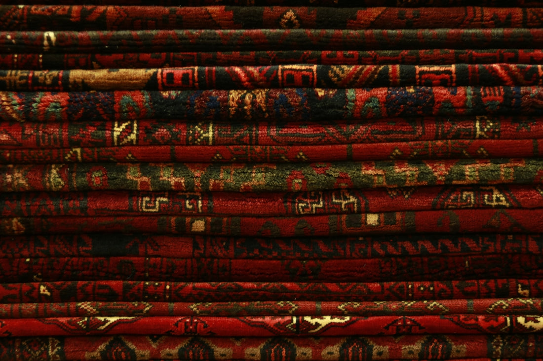 stack of red textiles