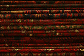 stack of red textiles