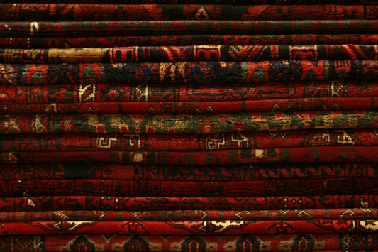 stack of red textiles
