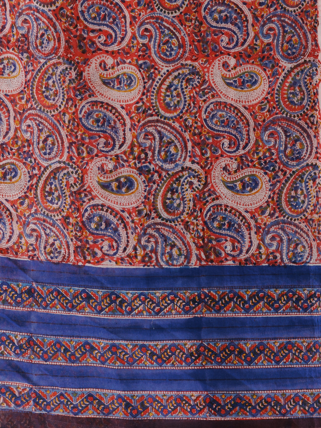 a red and blue paisley print scarf