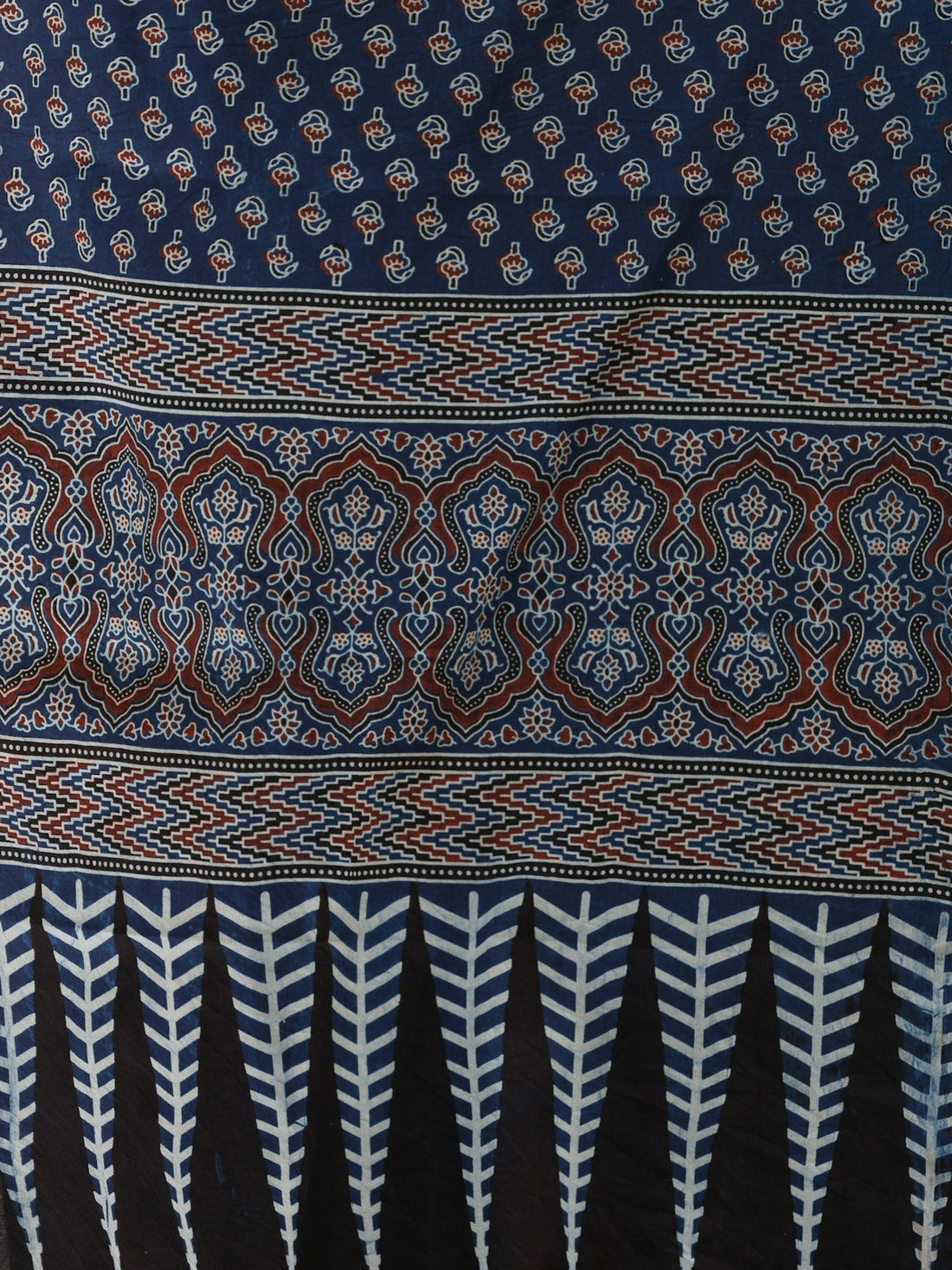 a close up of a blue and red cloth