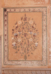 A painting of a tree on a wall