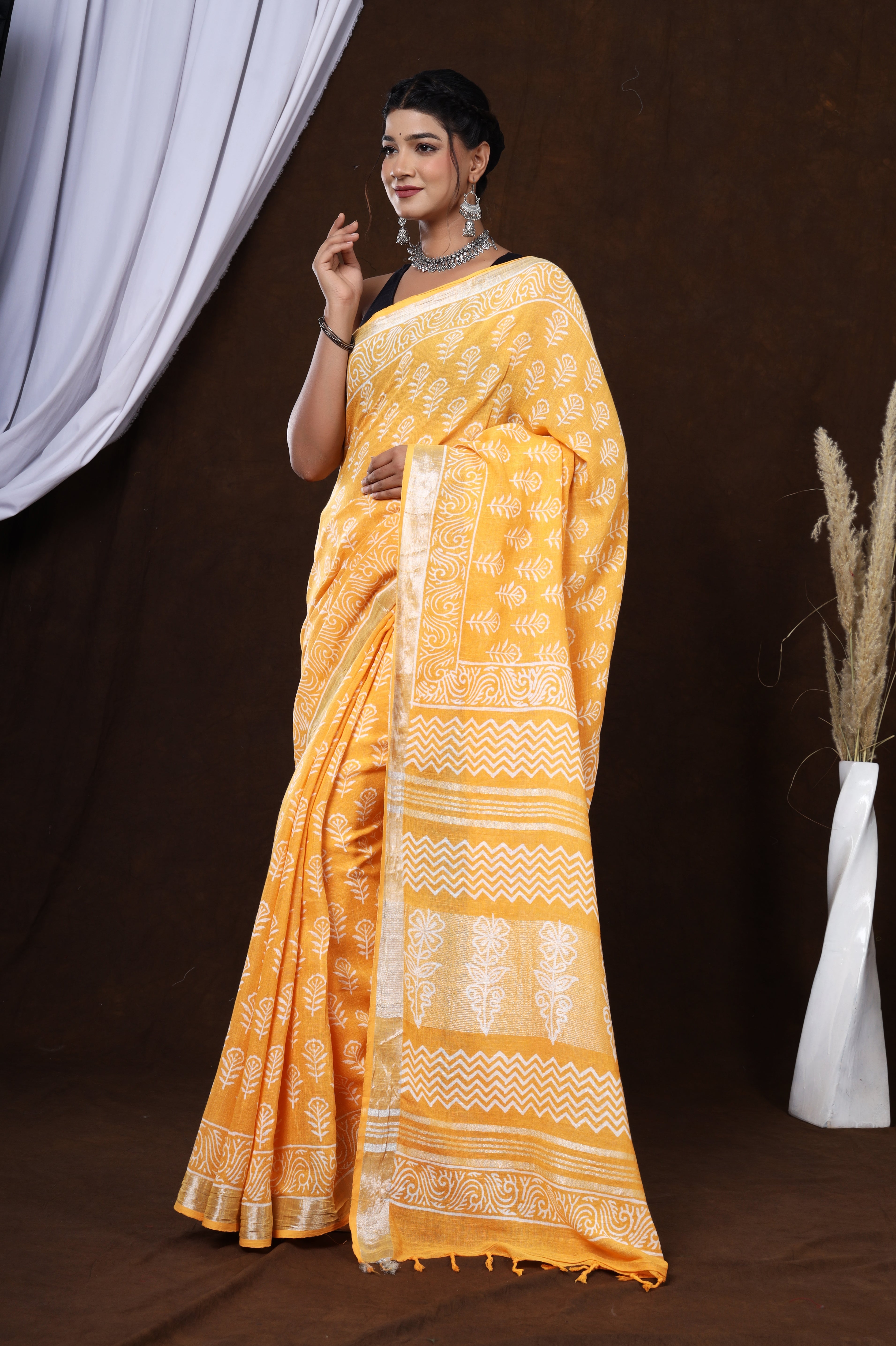 Sunset Blossom: Sanganeri Block Dabu Floral Saree in Yellowish Orange