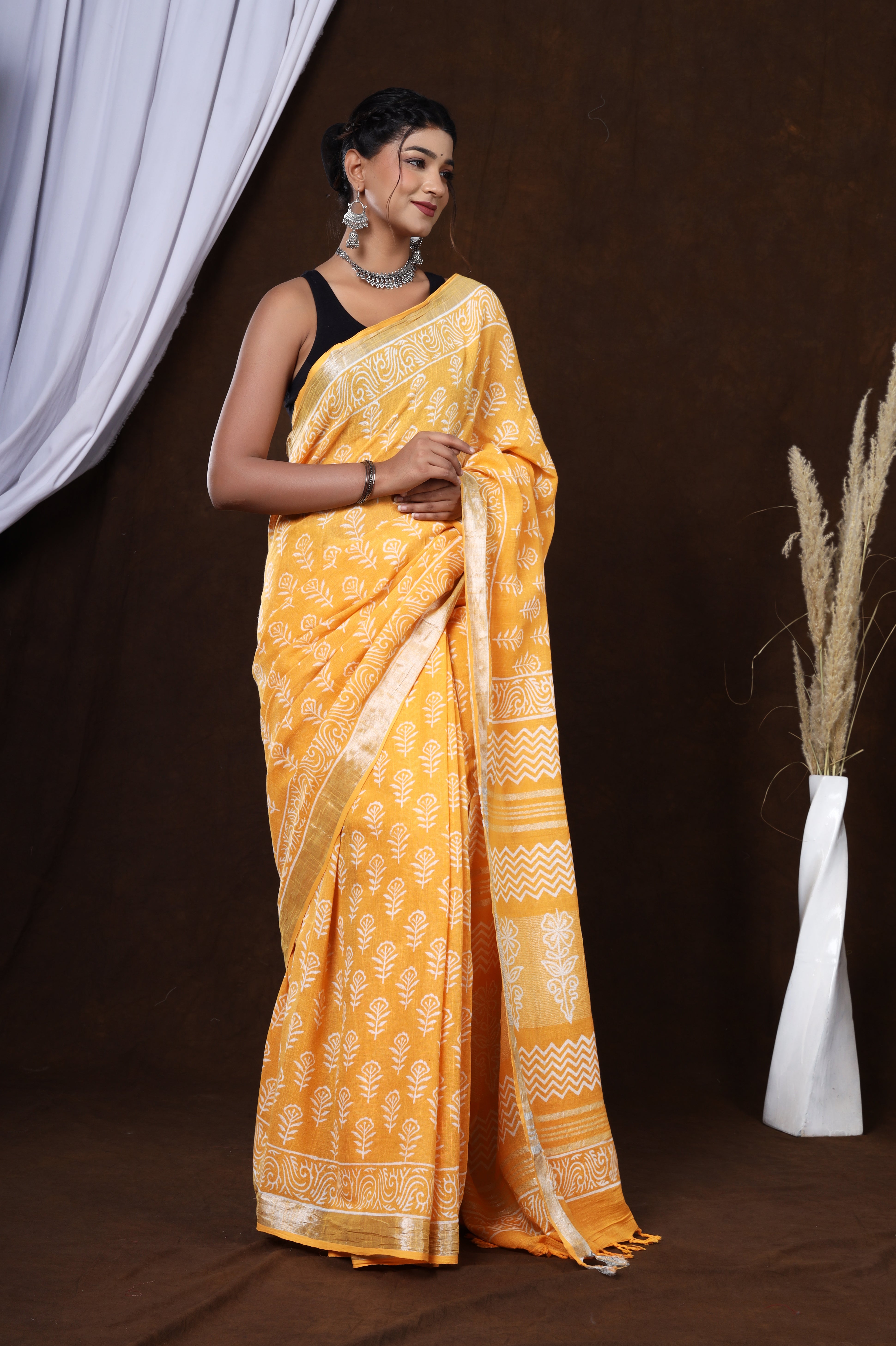 Sunset Blossom: Sanganeri Block Dabu Floral Saree in Yellowish Orange