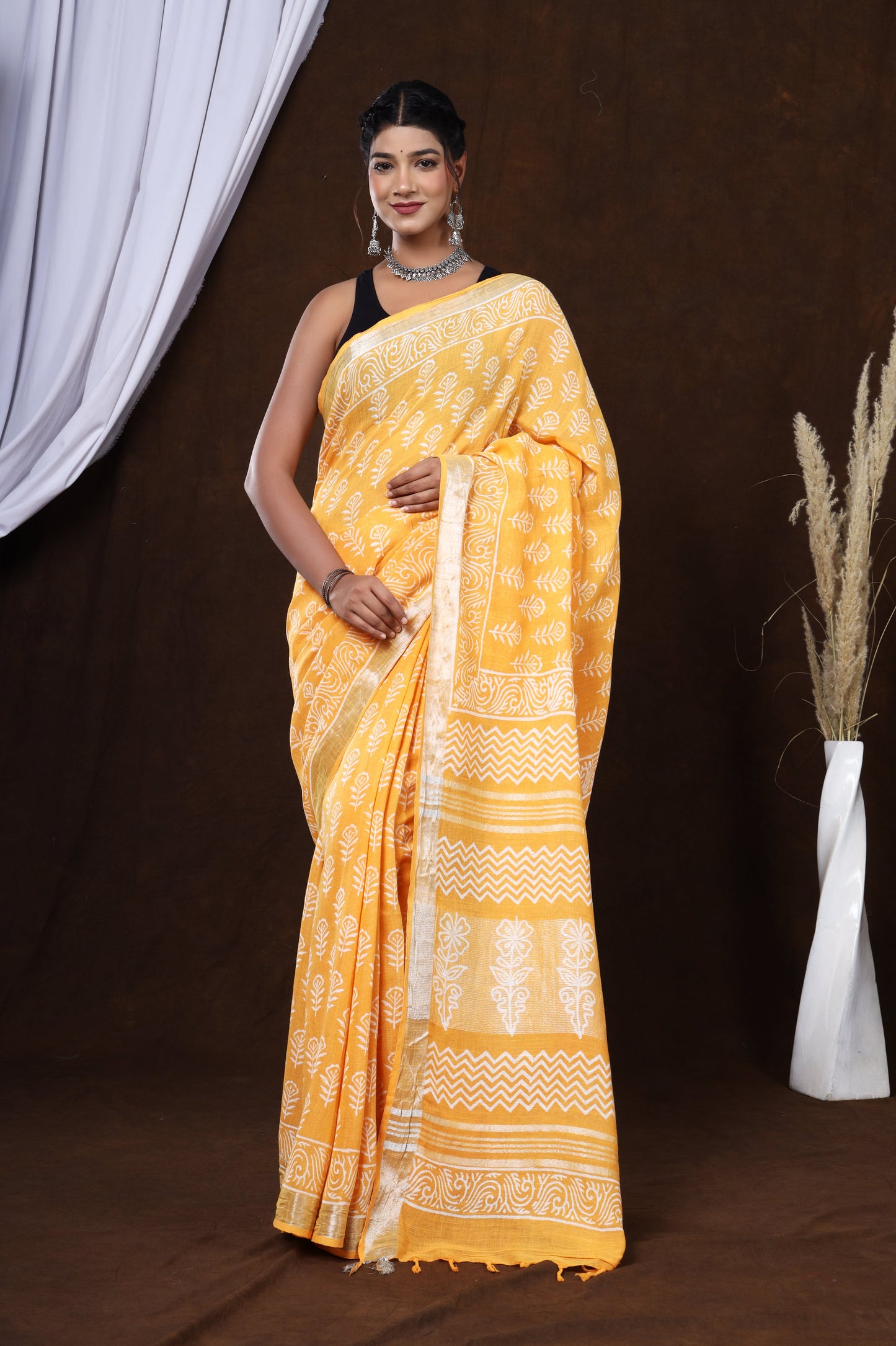 Sunset Blossom: Sanganeri Block Dabu Floral Saree in Yellowish Orange