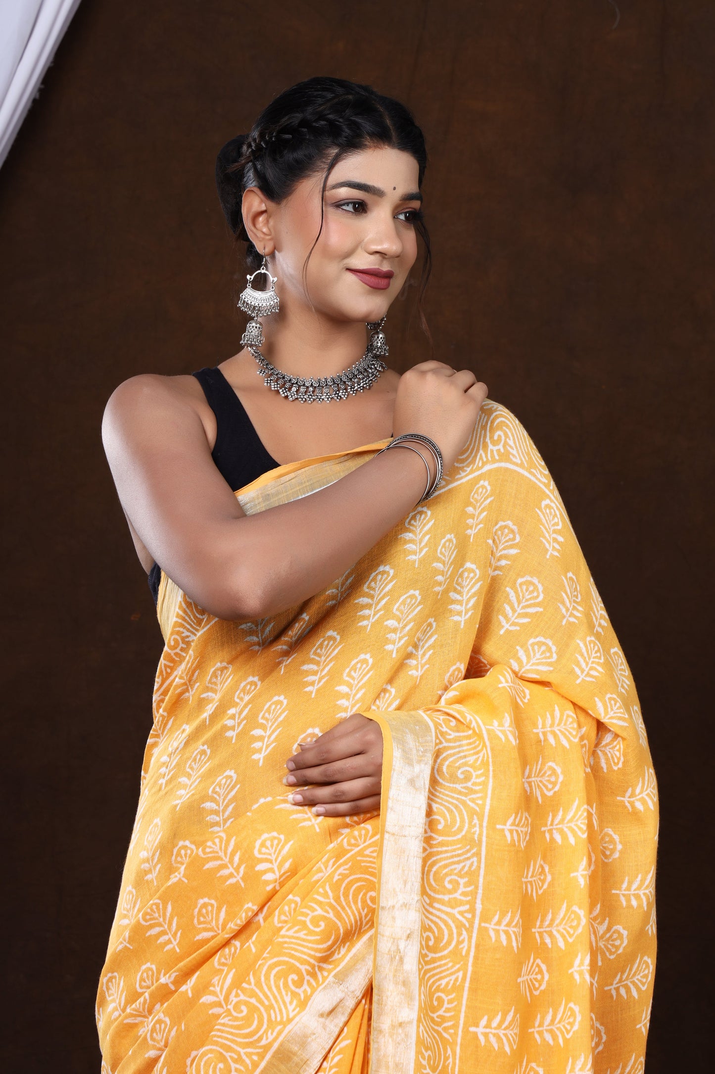 Sunset Blossom: Sanganeri Block Dabu Floral Saree in Yellowish Orange