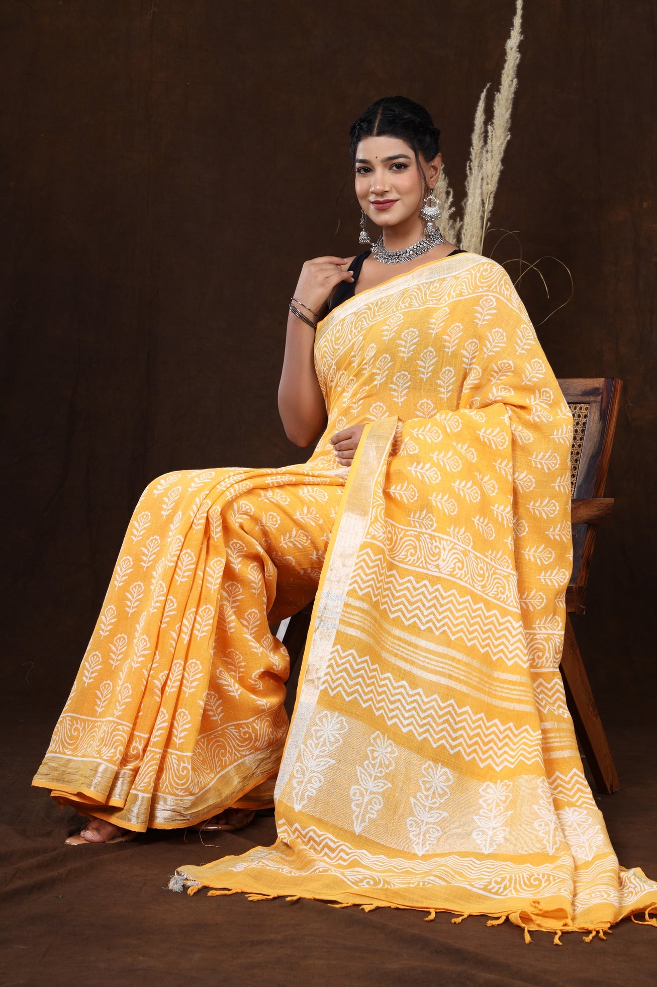 Sunset Blossom: Sanganeri Block Dabu Floral Saree in Yellowish Orange