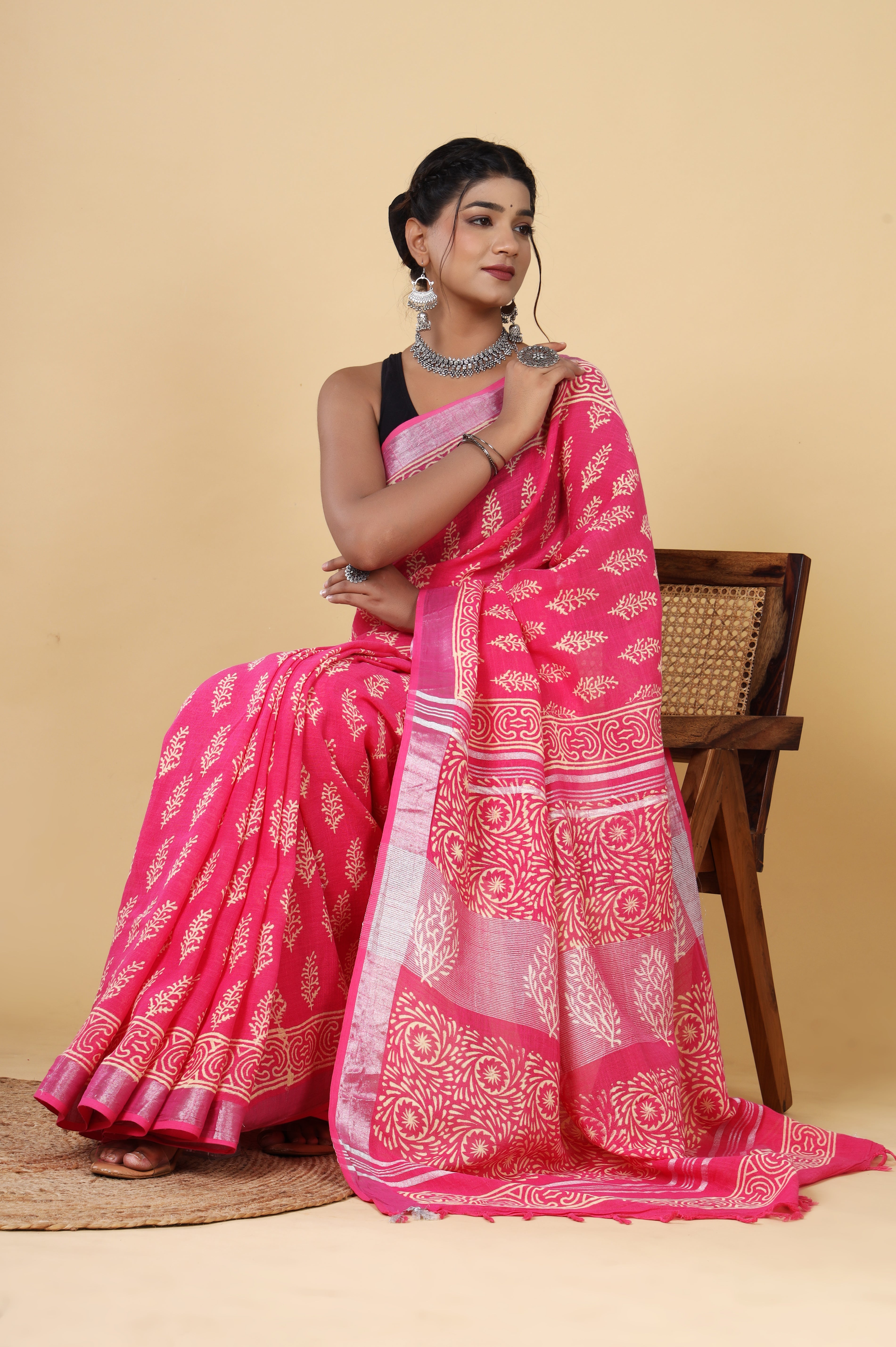 Rosy Blooms: Handcrafted Linen Saree in Pinkish Red with Booti Dyed Discharge Prints