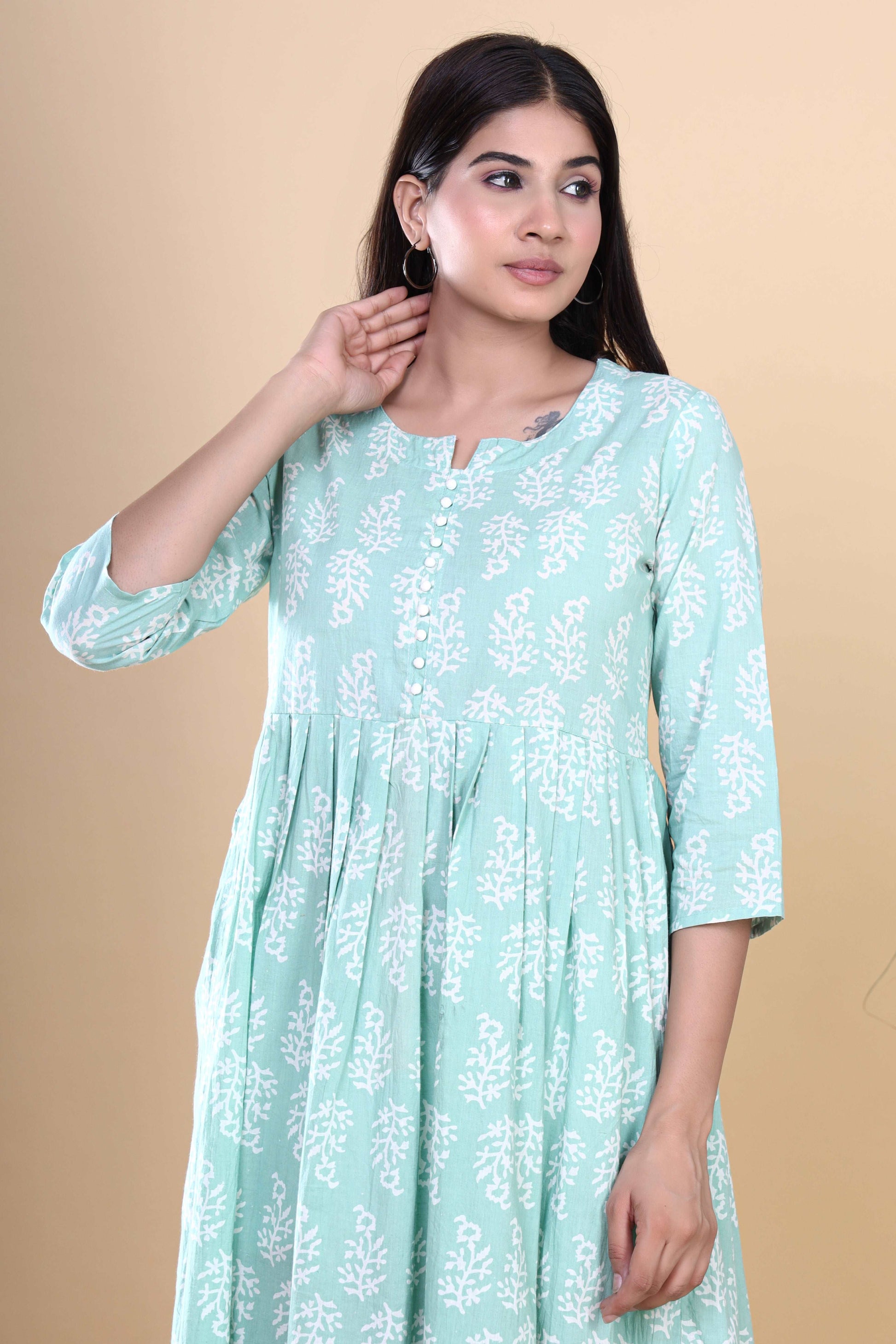 Jaipuri Blossoms: Handblock Printed Cotton Long Kurti in Bluish Cyan with Floral Artistry and Pocket Accent