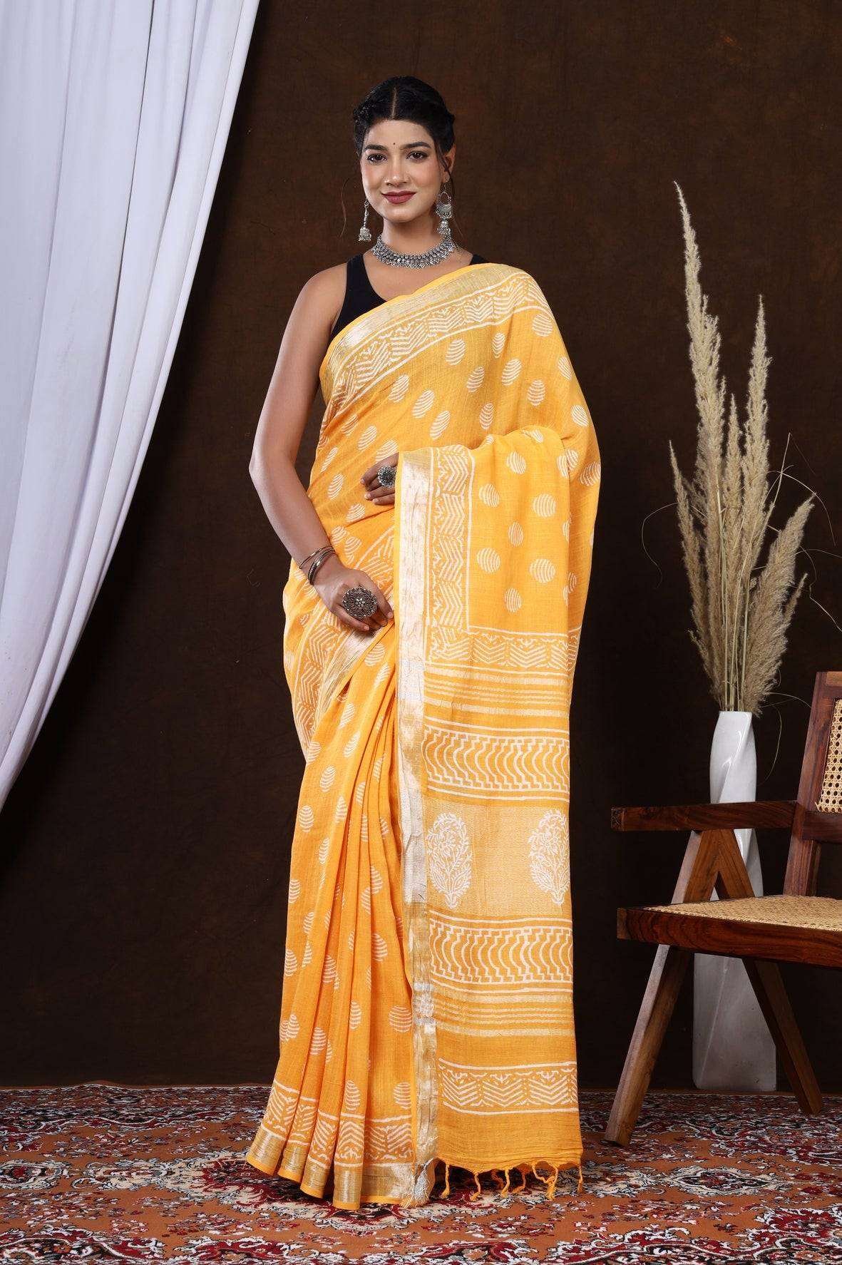 Golden Petals: Hand-Block Printed Linen Saree in Orange Floral Design