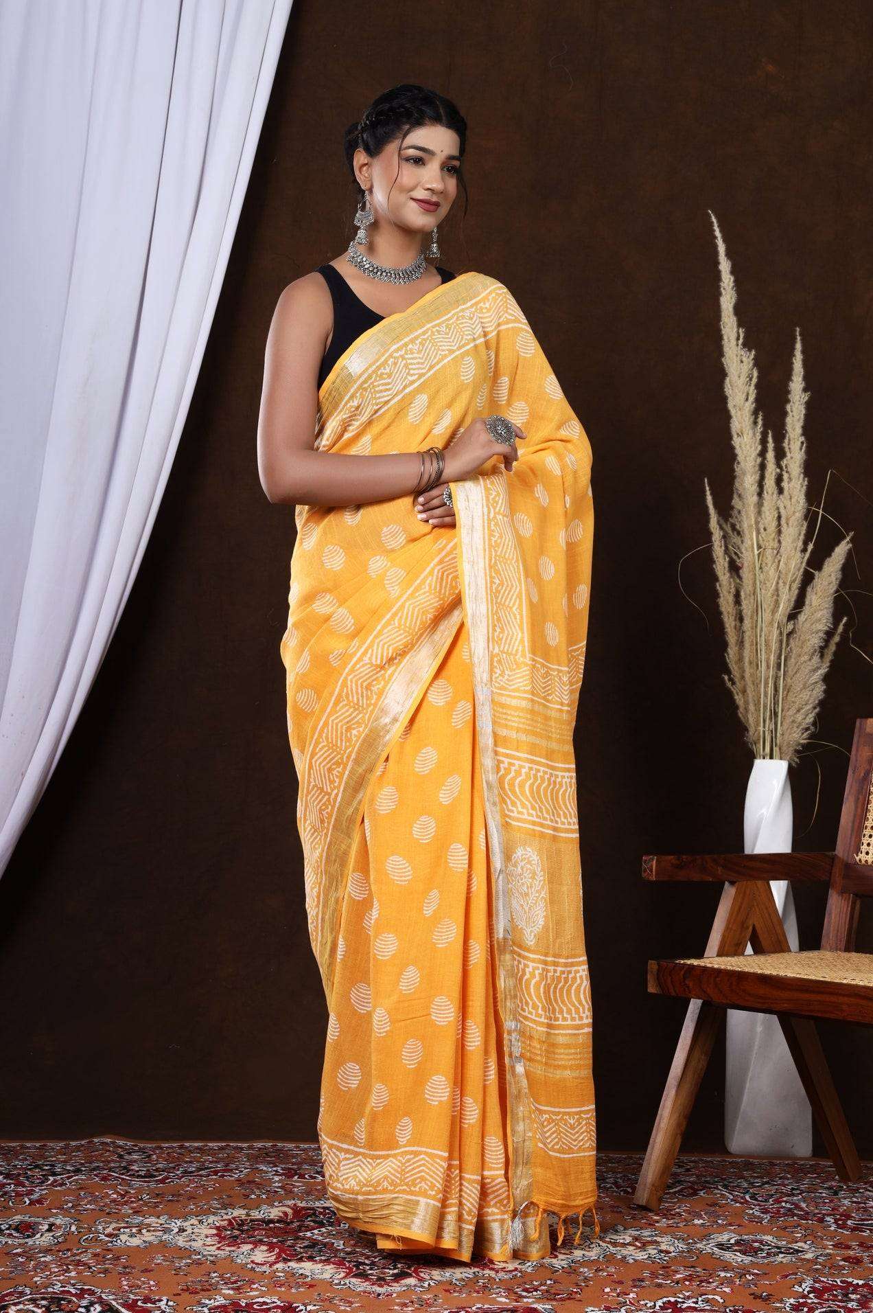 Golden Petals: Hand-Block Printed Linen Saree in Orange Floral Design