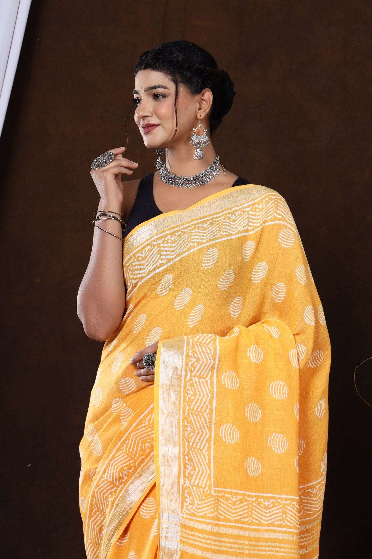 Golden Petals: Hand-Block Printed Linen Saree in Orange Floral Design