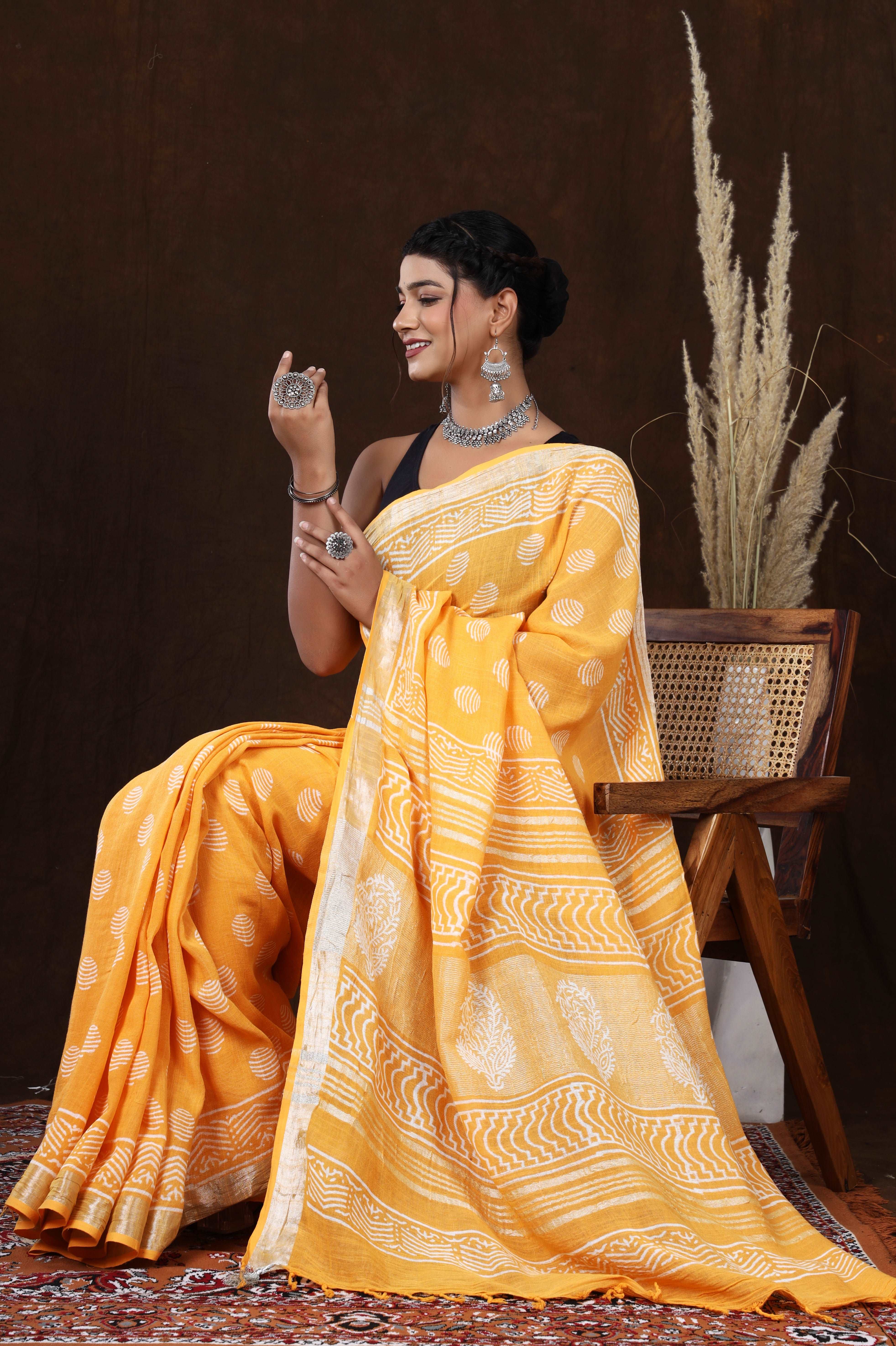 Golden Petals: Hand-Block Printed Linen Saree in Orange Floral Design