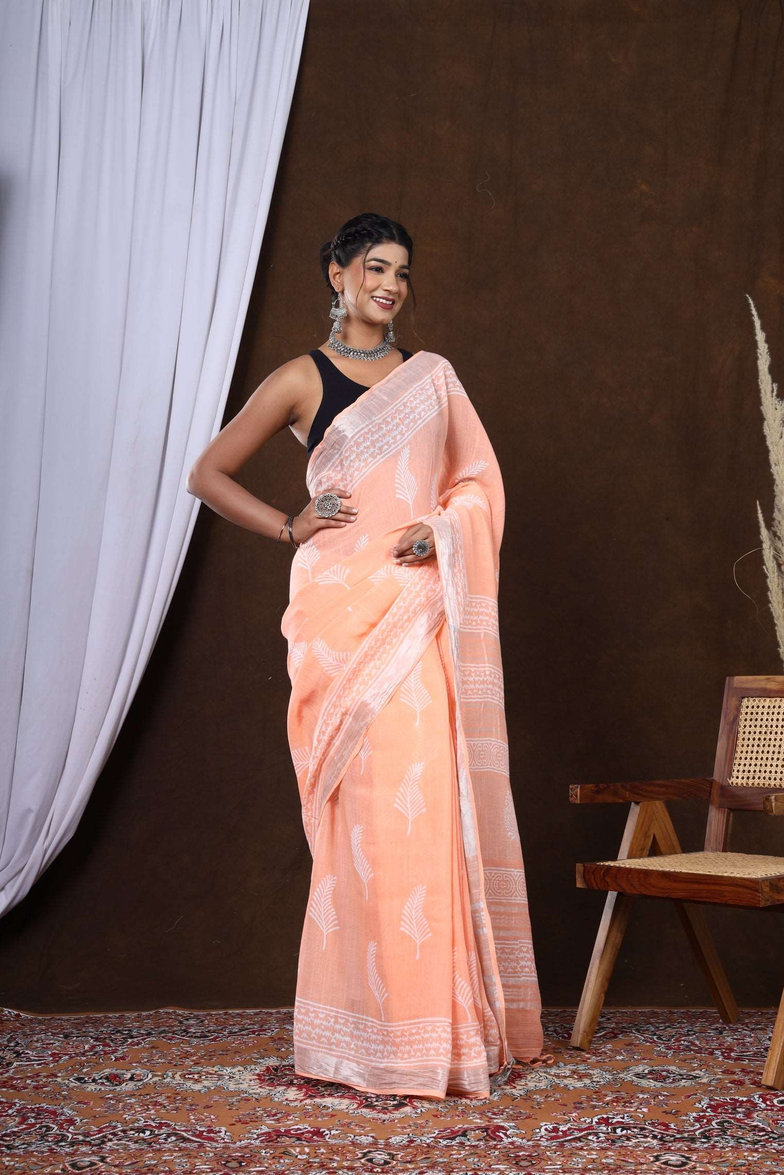 Crimson Spice Linen: Hand Block Dyed Discharge Printed Saree