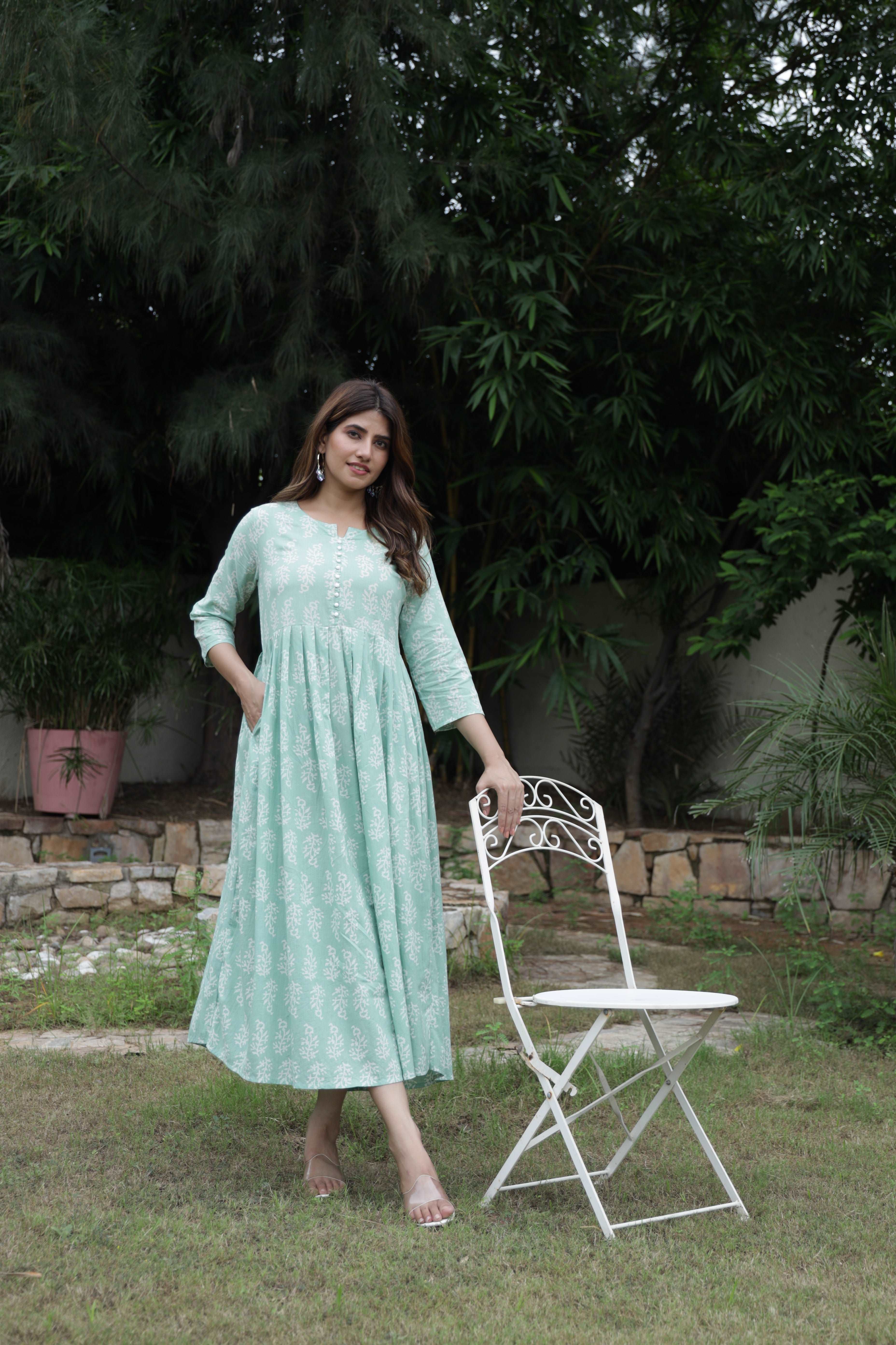 Jaipuri Blossoms: Handblock Printed Cotton Long Kurti in Bluish Cyan with Floral Artistry and Pocket Accent