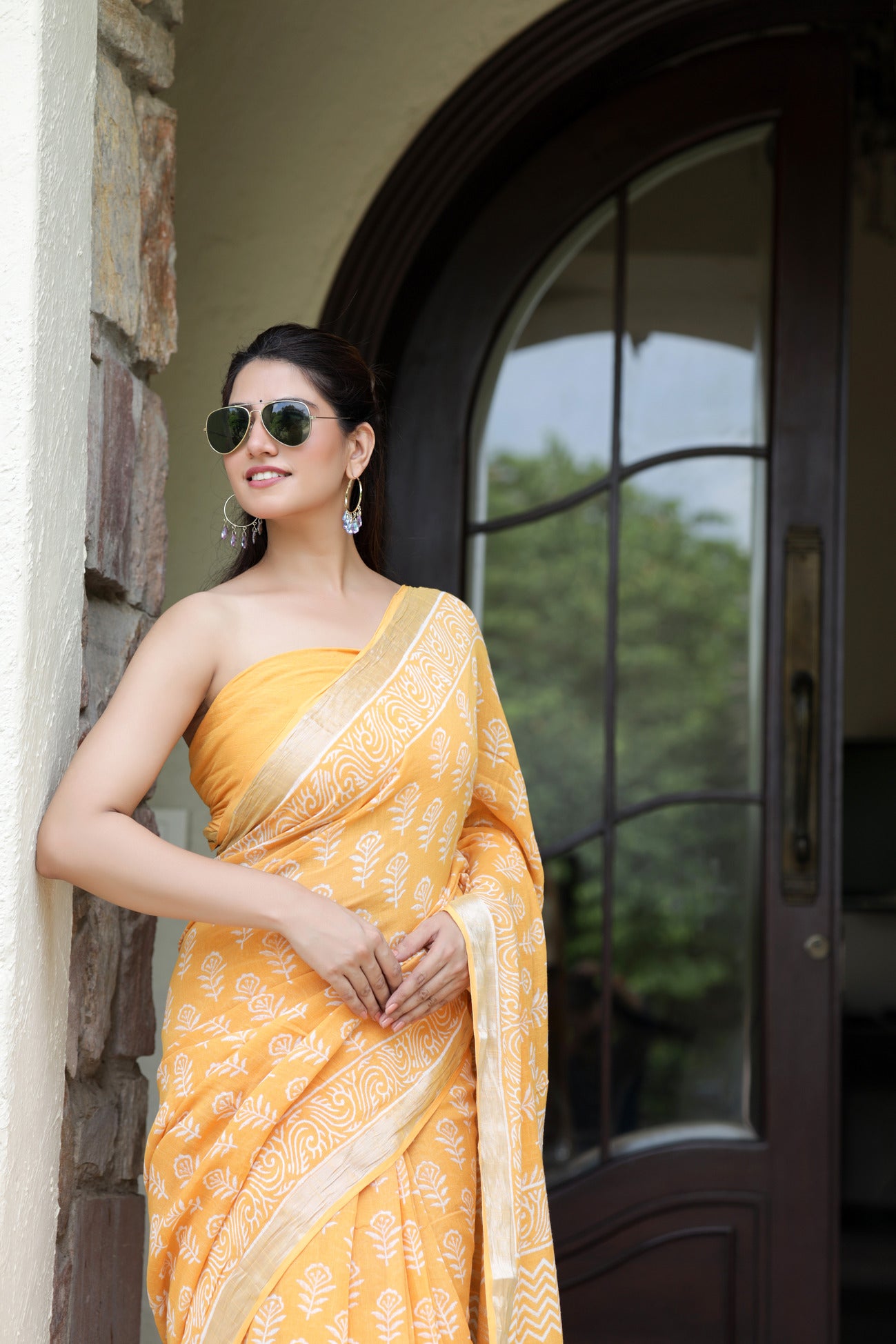 Sunset Blossom: Sanganeri Block Dabu Floral Saree in Yellowish Orange