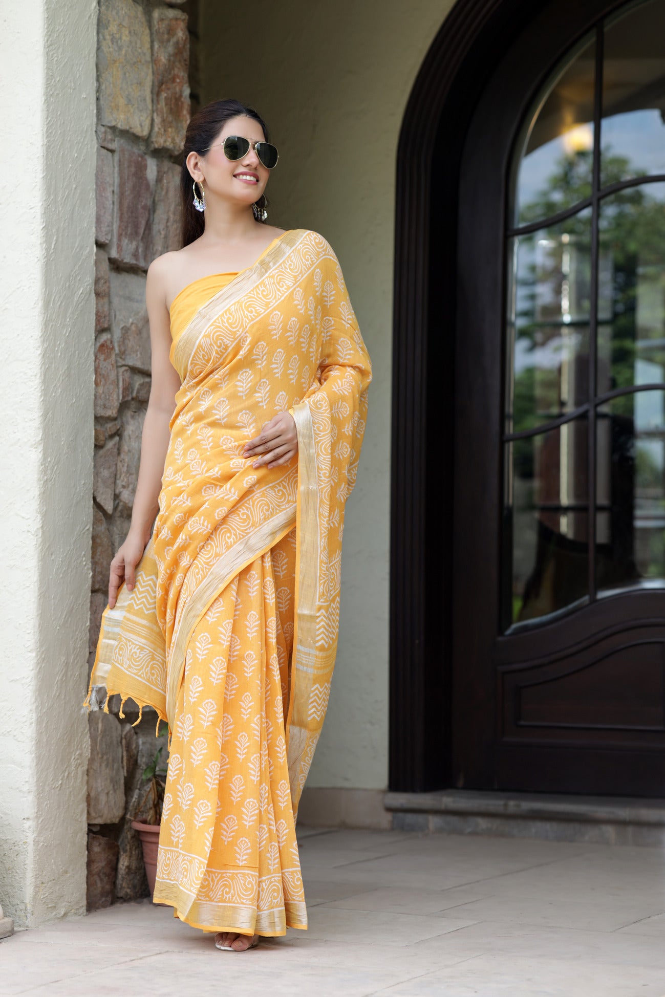 Sunset Blossom: Sanganeri Block Dabu Floral Saree in Yellowish Orange