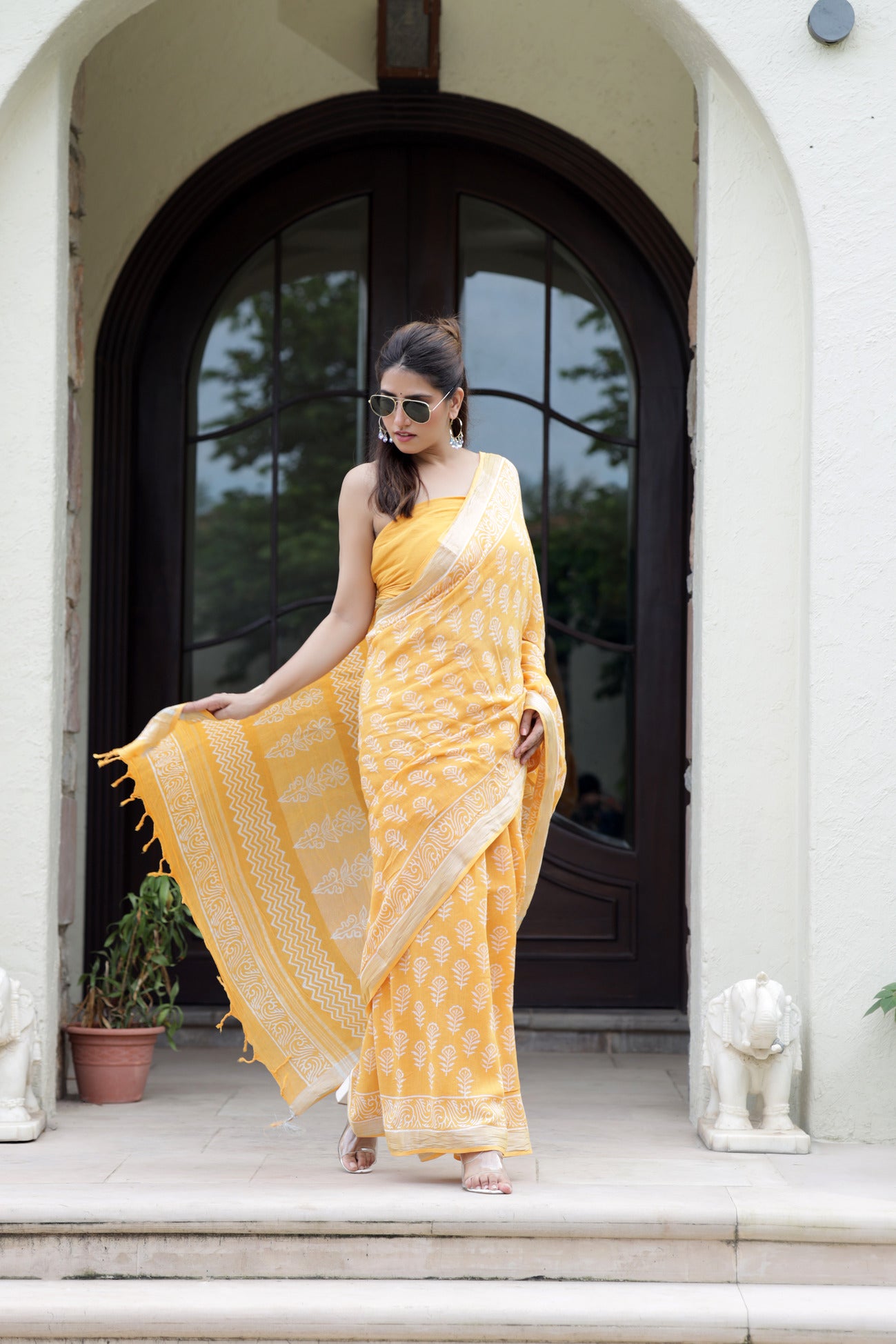 Sunset Blossom: Sanganeri Block Dabu Floral Saree in Yellowish Orange