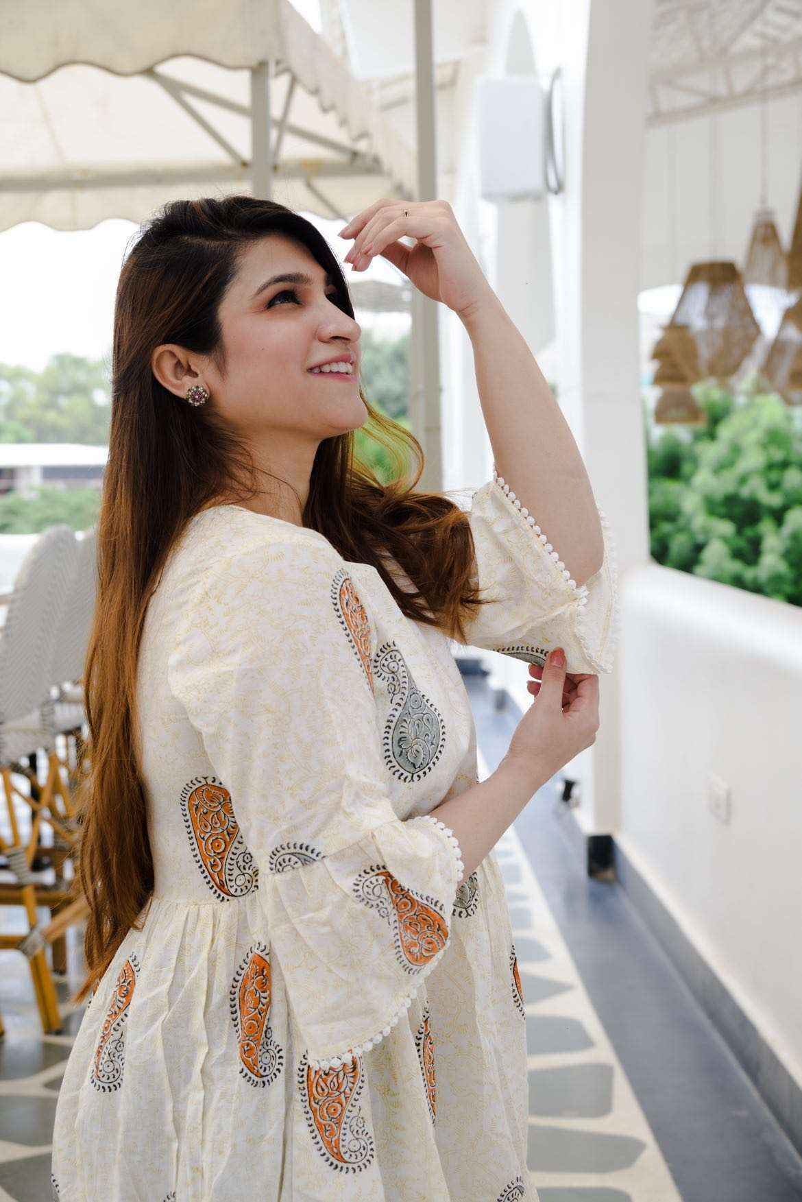 Srishti Textile White Cotton Short Kurti for Women Short Kurti vendor-white-cotton-short-kurti-model-smiling-pose